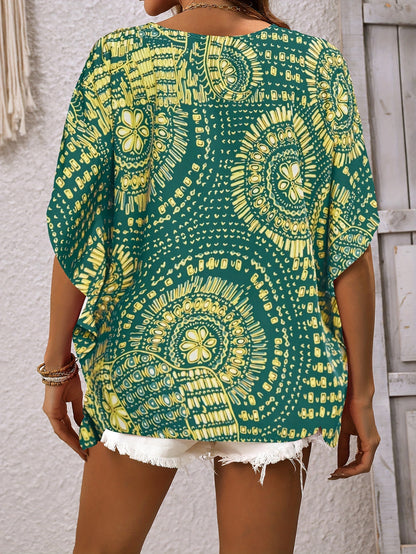 Mandalamönstrad topp med fladdermusärm