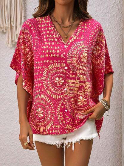 Mandalamönstrad topp med fladdermusärm